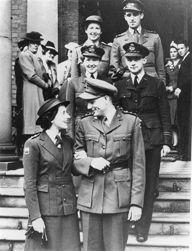 An all-uniform wedding 1943  Captain Earl Bastian and Lietenant Patience Bastian (Evans) of Wahroonga at their wedding