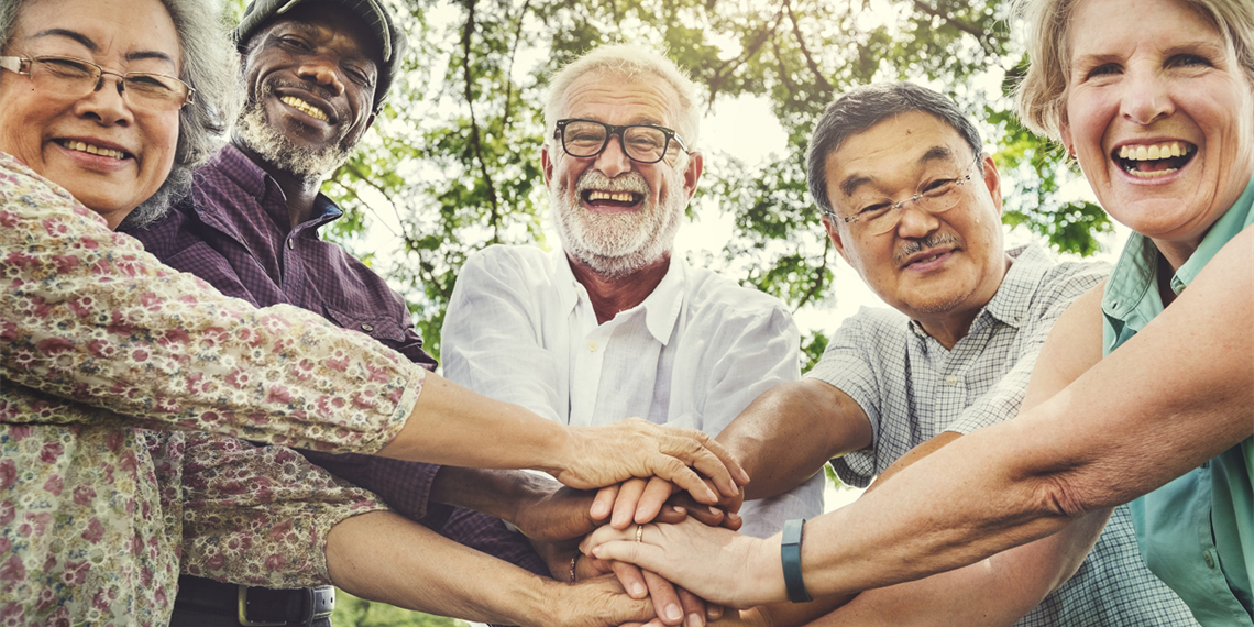 older people hands in the middle