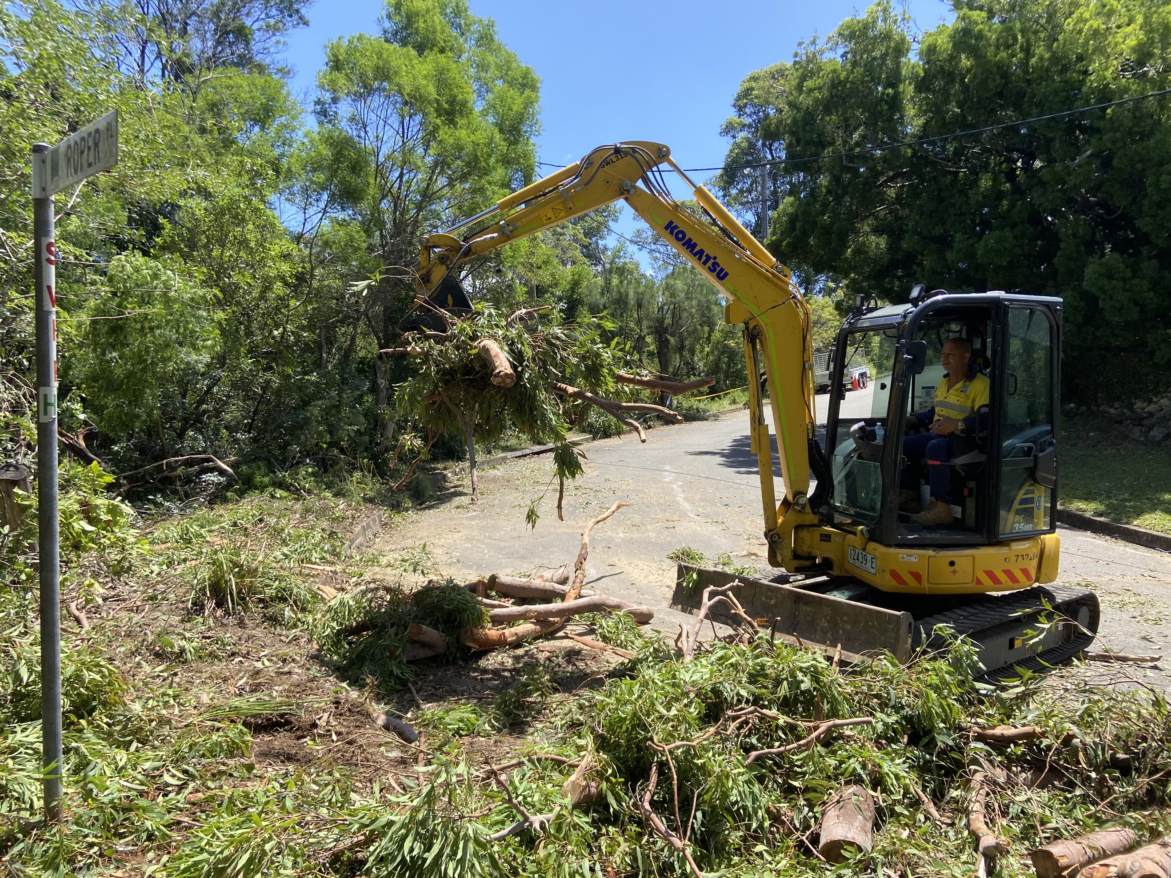 Council worker cleans up storm debris